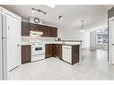 64 Prestwick Villas Se, Calgary, AB  - Indoor Photo Showing Kitchen 