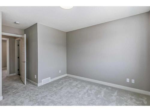 256 Waterford Heath, Chestermere, AB - Indoor Photo Showing Other Room