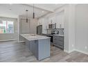 256 Waterford Heath, Chestermere, AB  - Indoor Photo Showing Kitchen With Upgraded Kitchen 