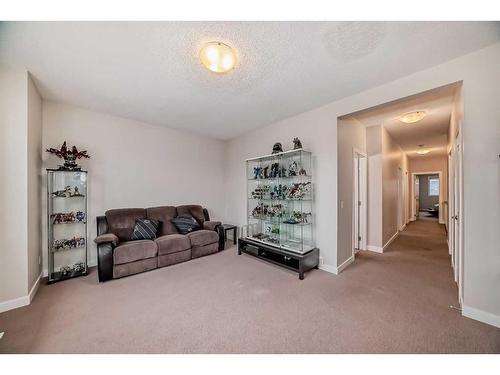 97 Panton Way Nw, Calgary, AB - Indoor Photo Showing Living Room