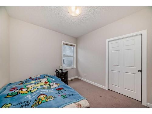 97 Panton Way Nw, Calgary, AB - Indoor Photo Showing Bedroom