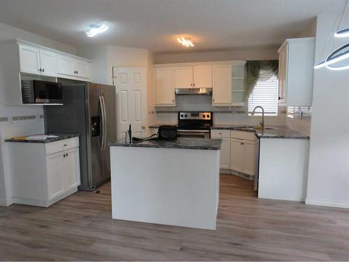 162 West Lakeview Crescent, Chestermere, AB - Indoor Photo Showing Kitchen With Stainless Steel Kitchen