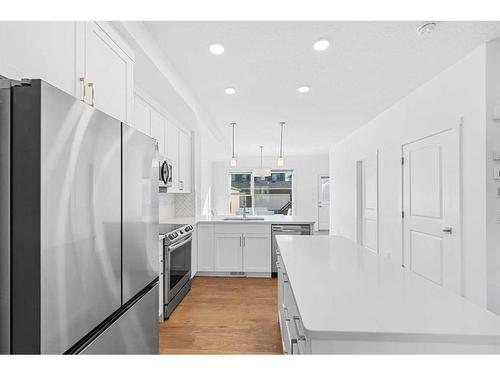 15 Walcrest Row Se, Calgary, AB - Indoor Photo Showing Kitchen With Stainless Steel Kitchen With Upgraded Kitchen