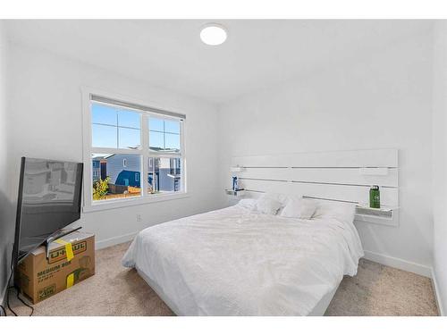 15 Walcrest Row Se, Calgary, AB - Indoor Photo Showing Bedroom