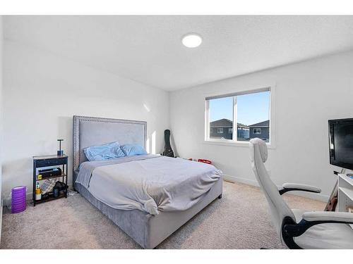 15 Walcrest Row Se, Calgary, AB - Indoor Photo Showing Bedroom