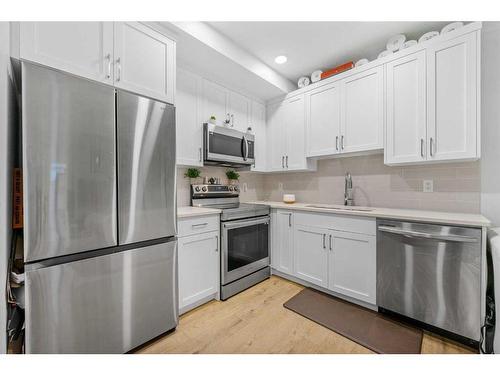 15 Walcrest Row Se, Calgary, AB - Indoor Photo Showing Kitchen With Stainless Steel Kitchen