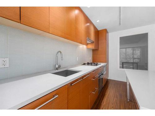 238-222 Riverfront Avenue Sw, Calgary, AB - Indoor Photo Showing Kitchen With Upgraded Kitchen