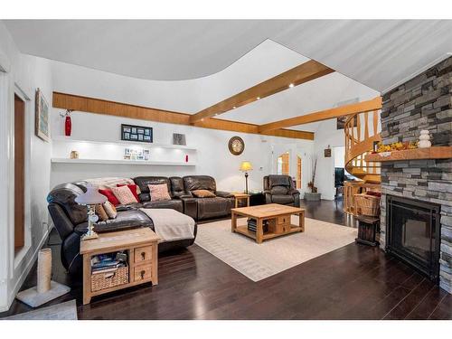 36 Crestview Estates, Rural Rocky View County, AB - Indoor Photo Showing Living Room With Fireplace