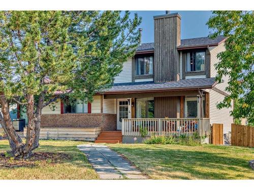 4 Strathcona Crescent Sw, Calgary, AB - Outdoor With Deck Patio Veranda With Facade