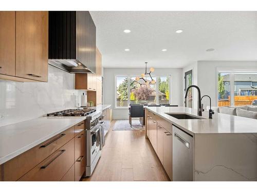 49 Westmore Park Sw, Calgary, AB - Indoor Photo Showing Kitchen With Upgraded Kitchen