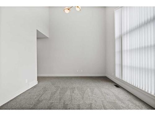 49 Westmore Park Sw, Calgary, AB - Indoor Photo Showing Other Room