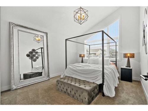 49 Westmore Park Sw, Calgary, AB - Indoor Photo Showing Bedroom