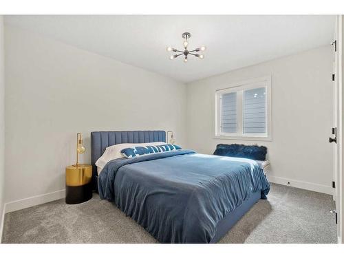 49 Westmore Park Sw, Calgary, AB - Indoor Photo Showing Bedroom