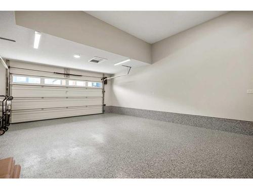 49 Westmore Park Sw, Calgary, AB - Indoor Photo Showing Garage