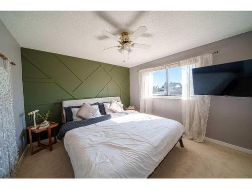 79 Shawmeadows Close Sw, Calgary, AB - Indoor Photo Showing Bedroom