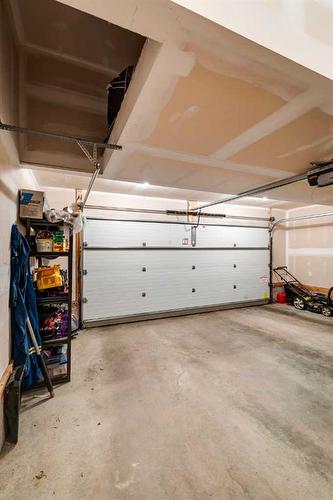 93 Legacy Manor Se, Calgary, AB - Indoor Photo Showing Garage