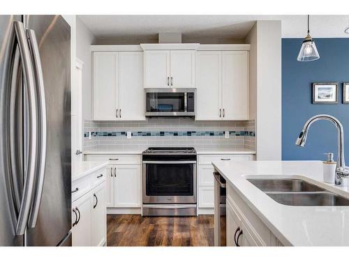 93 Legacy Manor Se, Calgary, AB - Indoor Photo Showing Kitchen With Stainless Steel Kitchen With Double Sink