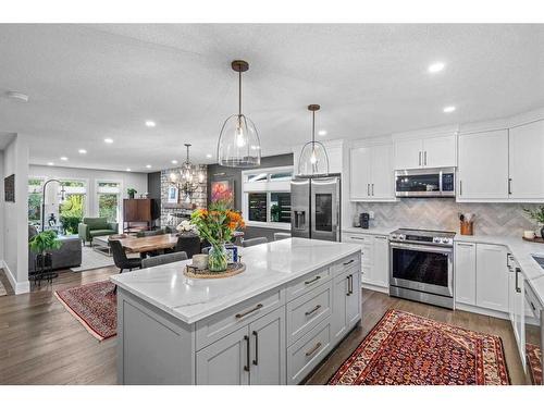 16 Sun Valley Drive Se, Calgary, AB - Indoor Photo Showing Kitchen With Stainless Steel Kitchen With Upgraded Kitchen