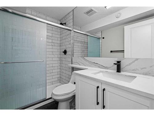 16 Sun Valley Drive Se, Calgary, AB - Indoor Photo Showing Bathroom