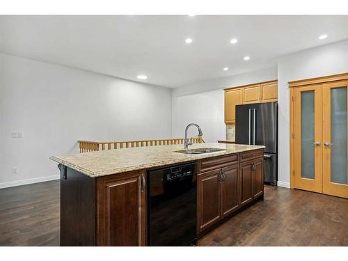 200 Prestwick Manor Se, Calgary, AB - Indoor Photo Showing Kitchen With Double Sink