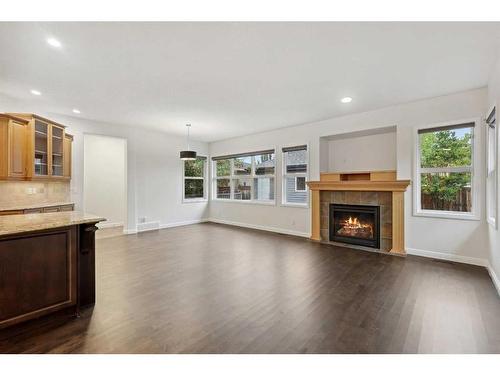 200 Prestwick Manor Se, Calgary, AB - Indoor Photo Showing Living Room With Fireplace