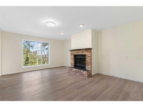 80 Macewan Park Rise Nw, Calgary, AB - Indoor Photo Showing Living Room With Fireplace