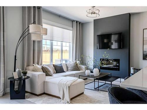 179 Greenwich Drive Nw, Calgary, AB - Indoor Photo Showing Living Room With Fireplace