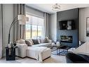 179 Greenwich Drive Nw, Calgary, AB  - Indoor Photo Showing Living Room With Fireplace 