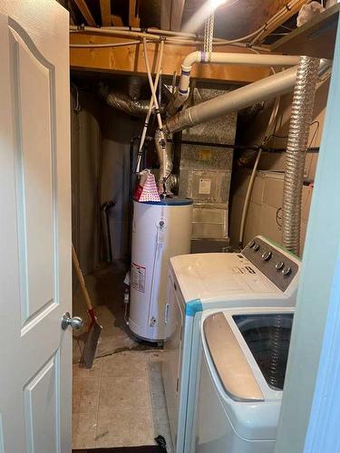 19 Tarawood Road Ne, Calgary, AB - Indoor Photo Showing Laundry Room