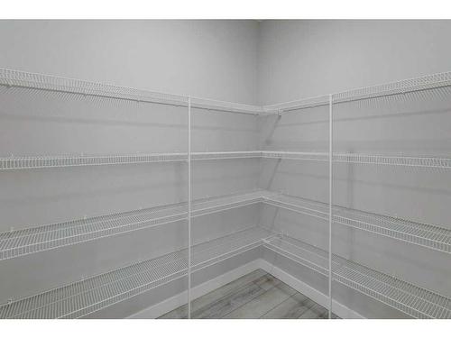 82 Edith Green Nw, Calgary, AB - Indoor With Storage