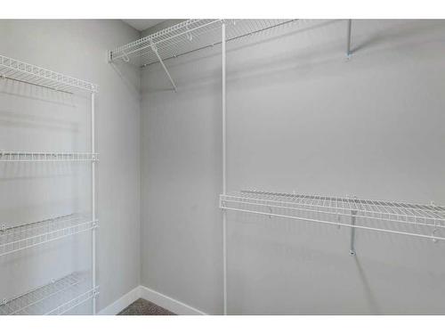 82 Edith Green Nw, Calgary, AB - Indoor With Storage