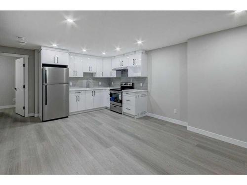 82 Edith Green Nw, Calgary, AB - Indoor Photo Showing Kitchen With Stainless Steel Kitchen