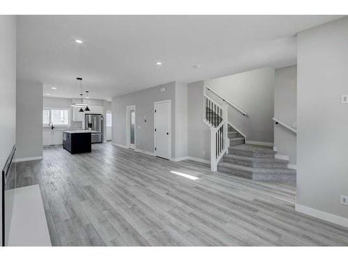 82 Edith Green Nw, Calgary, AB - Indoor Photo Showing Living Room