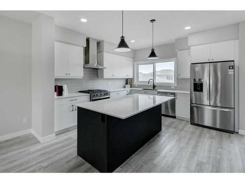 82 Edith Green Nw, Calgary, AB - Indoor Photo Showing Kitchen With Stainless Steel Kitchen With Upgraded Kitchen