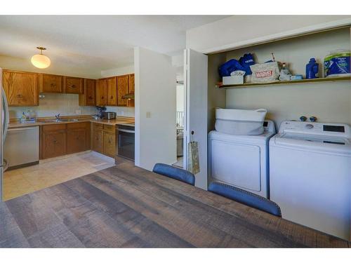 66-23 Glamis Drive Sw, Calgary, AB - Indoor Photo Showing Laundry Room