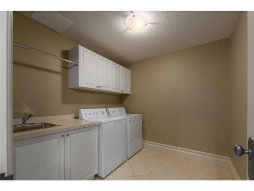 127 Solace Ridge Place, Rural Rocky View County, AB - Indoor Photo Showing Laundry Room