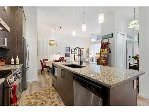 132-122 Mahogany Centre Se, Calgary, AB - Indoor Photo Showing Kitchen With Double Sink With Upgraded Kitchen