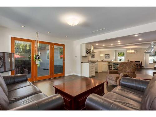 1120 Lake Christina Place Se, Calgary, AB - Indoor Photo Showing Living Room