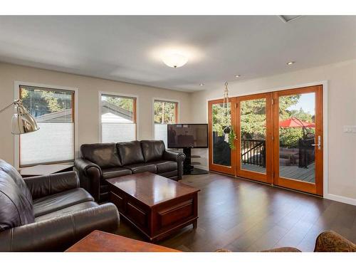 1120 Lake Christina Place Se, Calgary, AB - Indoor Photo Showing Living Room