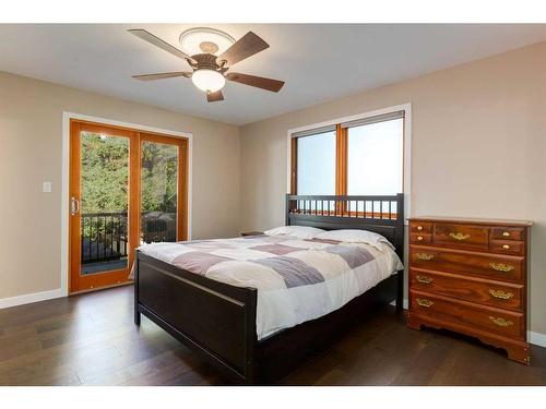 1120 Lake Christina Place Se, Calgary, AB - Indoor Photo Showing Bedroom