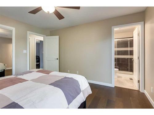 1120 Lake Christina Place Se, Calgary, AB - Indoor Photo Showing Bedroom