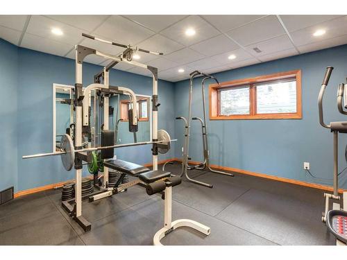 1120 Lake Christina Place Se, Calgary, AB - Indoor Photo Showing Gym Room