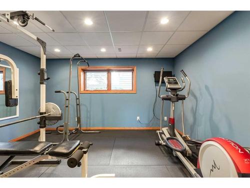 1120 Lake Christina Place Se, Calgary, AB - Indoor Photo Showing Gym Room