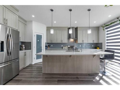 685 Windrow Manor Sw, Airdrie, AB - Indoor Photo Showing Kitchen With Stainless Steel Kitchen With Upgraded Kitchen