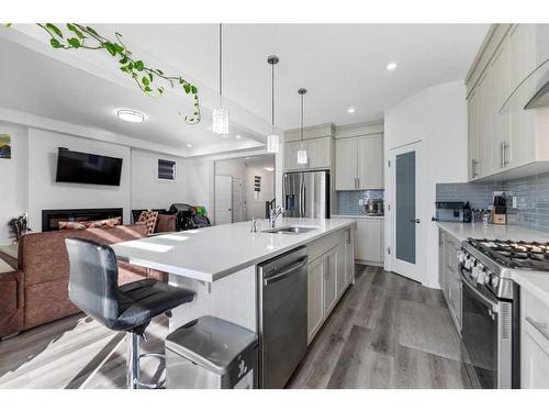 685 Windrow Manor Sw, Airdrie, AB - Indoor Photo Showing Kitchen With Stainless Steel Kitchen With Upgraded Kitchen