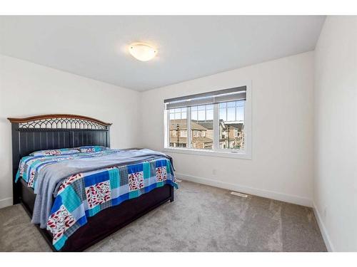 685 Windrow Manor Sw, Airdrie, AB - Indoor Photo Showing Bedroom