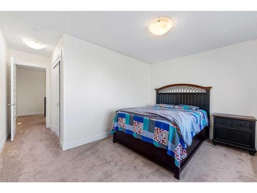 685 Windrow Manor Sw, Airdrie, AB - Indoor Photo Showing Bedroom