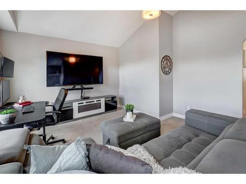 75 Nolanfield Court Nw, Calgary, AB - Indoor Photo Showing Living Room