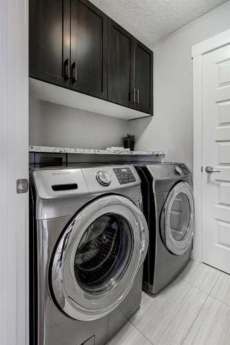 75 Nolanfield Court Nw, Calgary, AB - Indoor Photo Showing Laundry Room