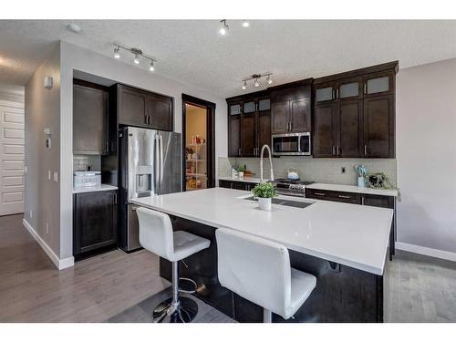 75 Nolanfield Court Nw, Calgary, AB - Indoor Photo Showing Kitchen With Double Sink With Upgraded Kitchen